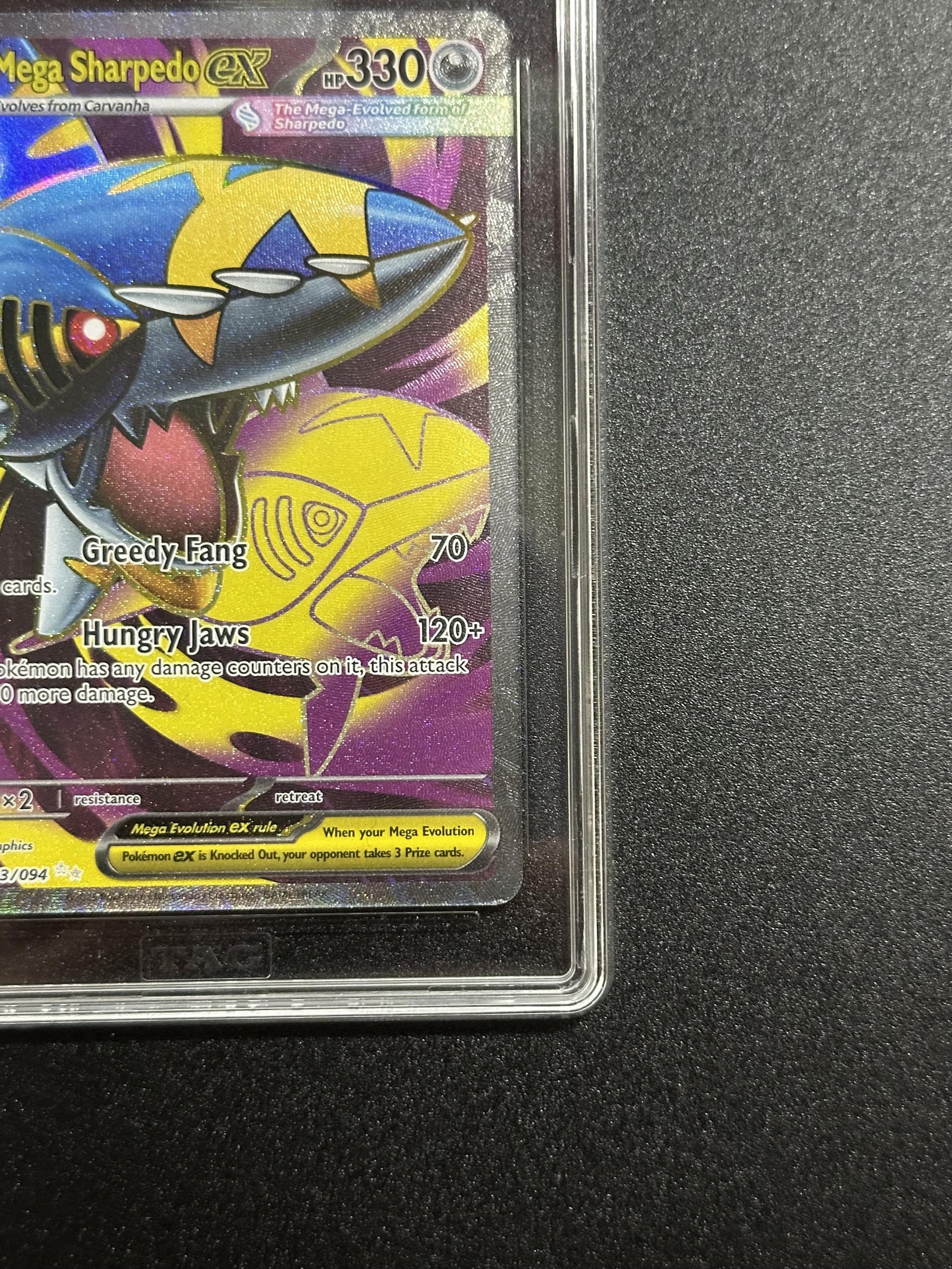 Mega Sharpedo ex 113/094 - bottom right corner